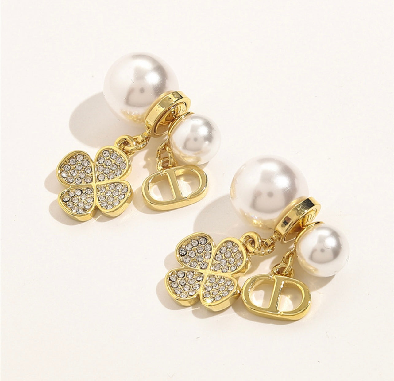 4 pearl earrings